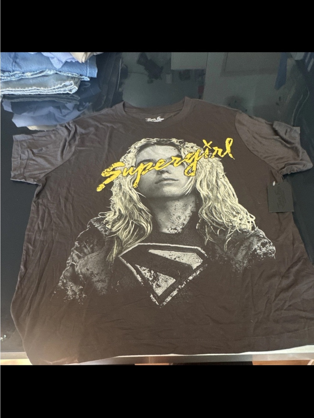 Junk Food Clothing Black Tee with Yellow Supergirl Script